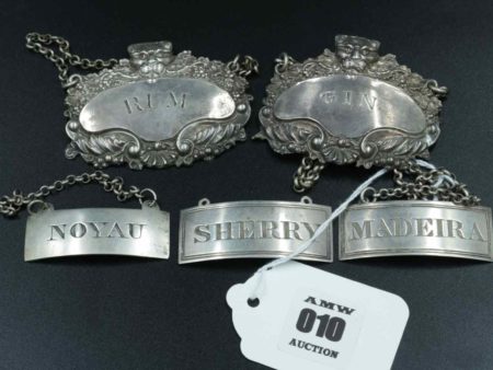 05 - 10.1_A Collection of Silver Decanter Labels_95564