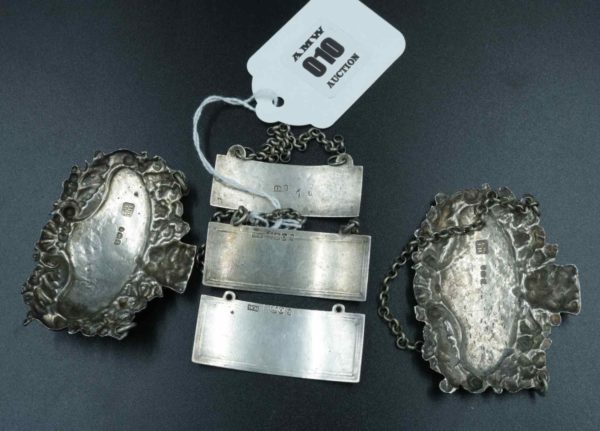 05 - 10.5_A Collection of Silver Decanter Labels_95564