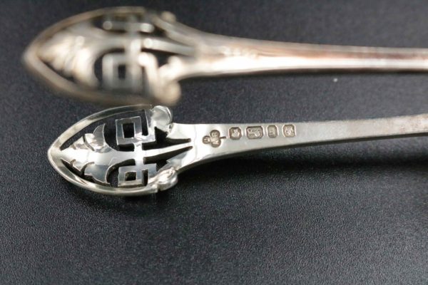 05 - 123.7_Collection of silver sugar tongs_98361