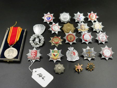 05 - 146.1_Collection of Fire brigade helmet badges_98384