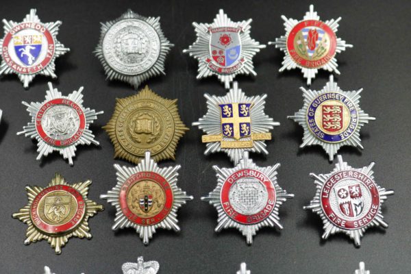 05 - 146.3_Collection of Fire brigade helmet badges_98384
