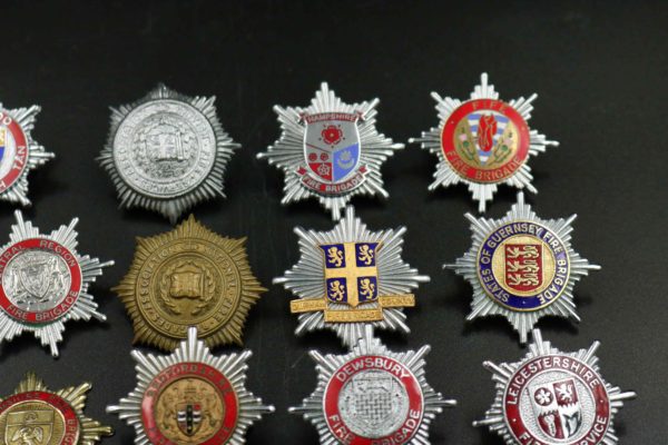 05 - 146.8_Collection of Fire brigade helmet badges_98384