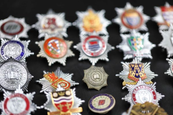05 - 147.4_Collection of fire brigade helmet badges etc_98385