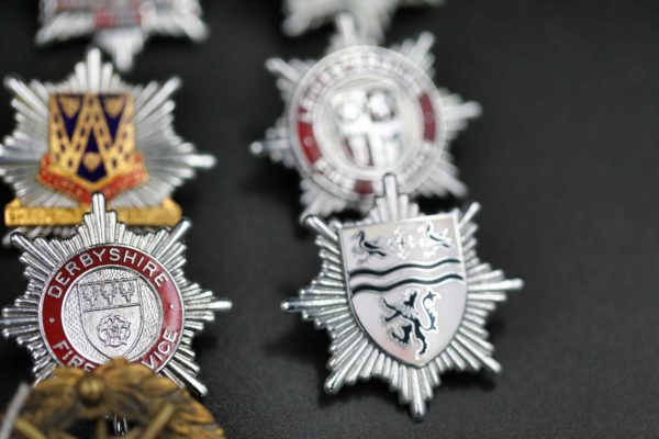 05 - 147.6_Collection of fire brigade helmet badges etc_98385
