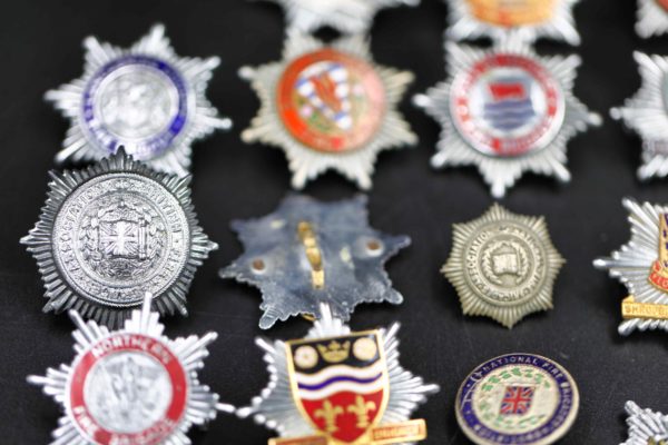 05 - 147.7_Collection of fire brigade helmet badges etc_98385