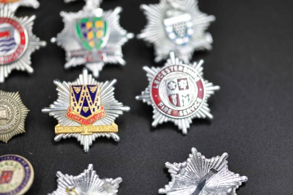 05 - 147.8_Collection of fire brigade helmet badges etc_98385