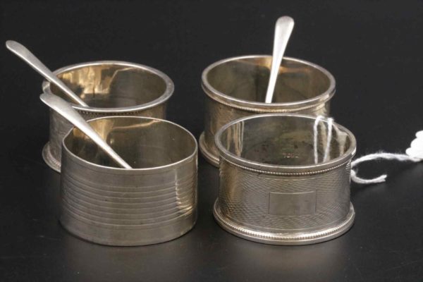 05 - 176.3_Four Silver Hallmarked Napkin Rings and 3 Spoons_95769