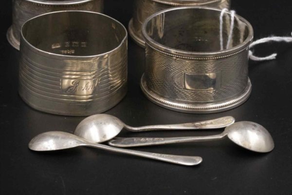 05 - 176.4_Four Silver Hallmarked Napkin Rings and 3 Spoons_95769