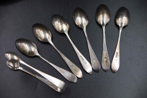 05 - 235.7_Set of Silver spoons sugar nips_98481