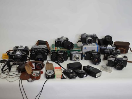 05 - 236.1_Large Box of Various Cameras with Lenses_98482