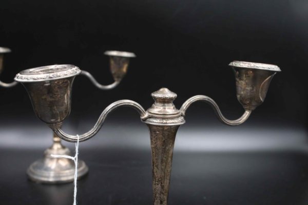 05 - 279.3_A pair of silver hallmarked candle sticks_98778