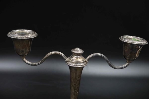 05 - 279.5_A pair of silver hallmarked candle sticks_98778