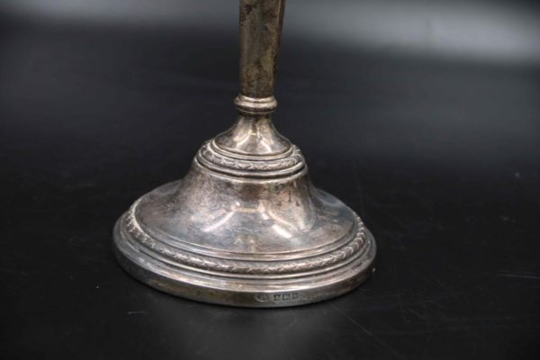 05 - 279.6_A pair of silver hallmarked candle sticks_98778