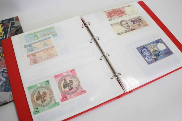 05 - 285.3_2x Albums of various Uncirculated currency Notes_98931