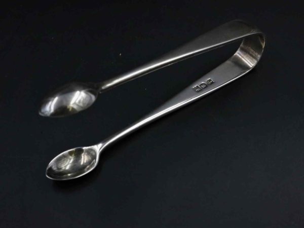05 - 328.5_Six Silver Spoons Set of Tongs_96024