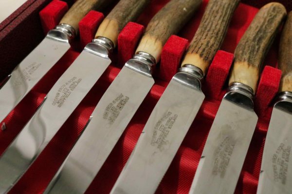 05 - 33.6_Two sets of stag handled steak knives and forks_97589
