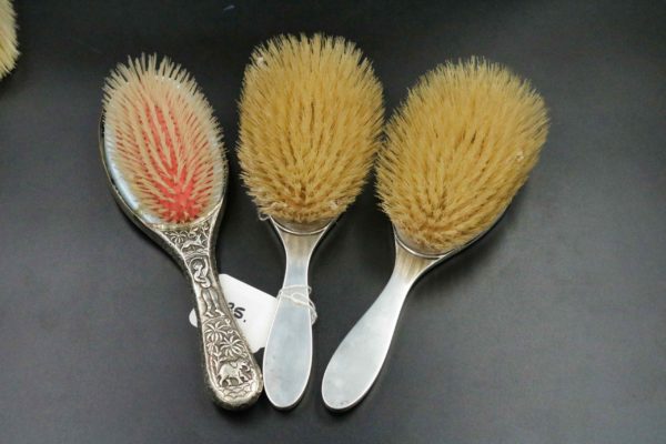 05 - 35.4_A selection of silver brushes and other white metal brushes_97591