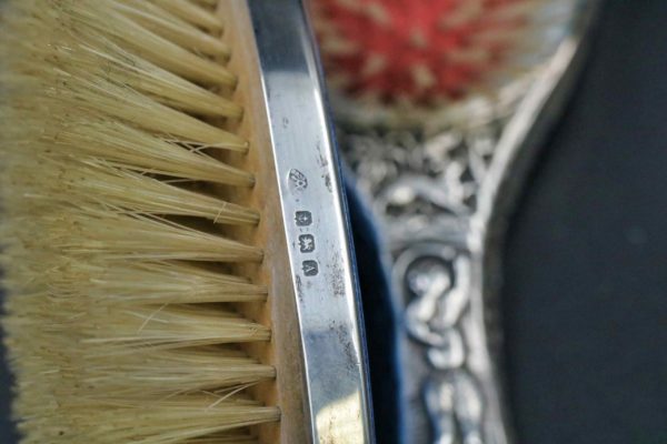 05 - 35.6_A selection of silver brushes and other white metal brushes_97591