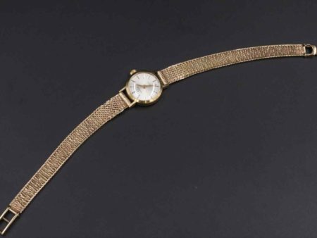 05 - 91.1_9CT Gold Garrard Watch Inscribed on the Back_95649