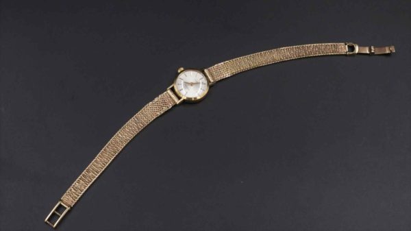 05 - 91.1_9CT Gold Garrard Watch Inscribed on the Back_95649